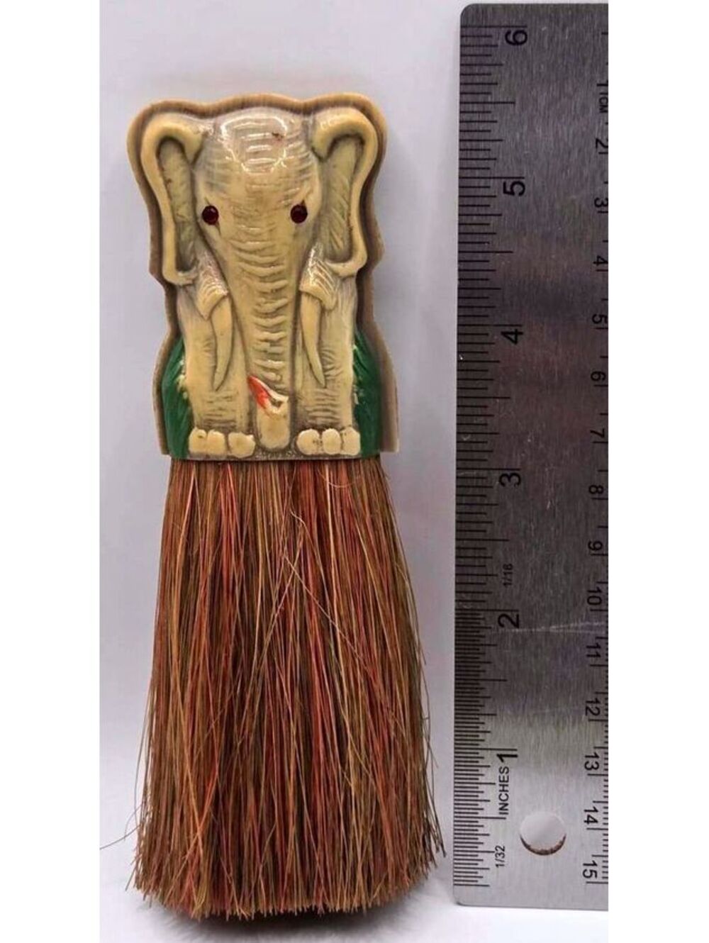 Vintage Elephant Clothes Brush with Red Rhinestone Eyes